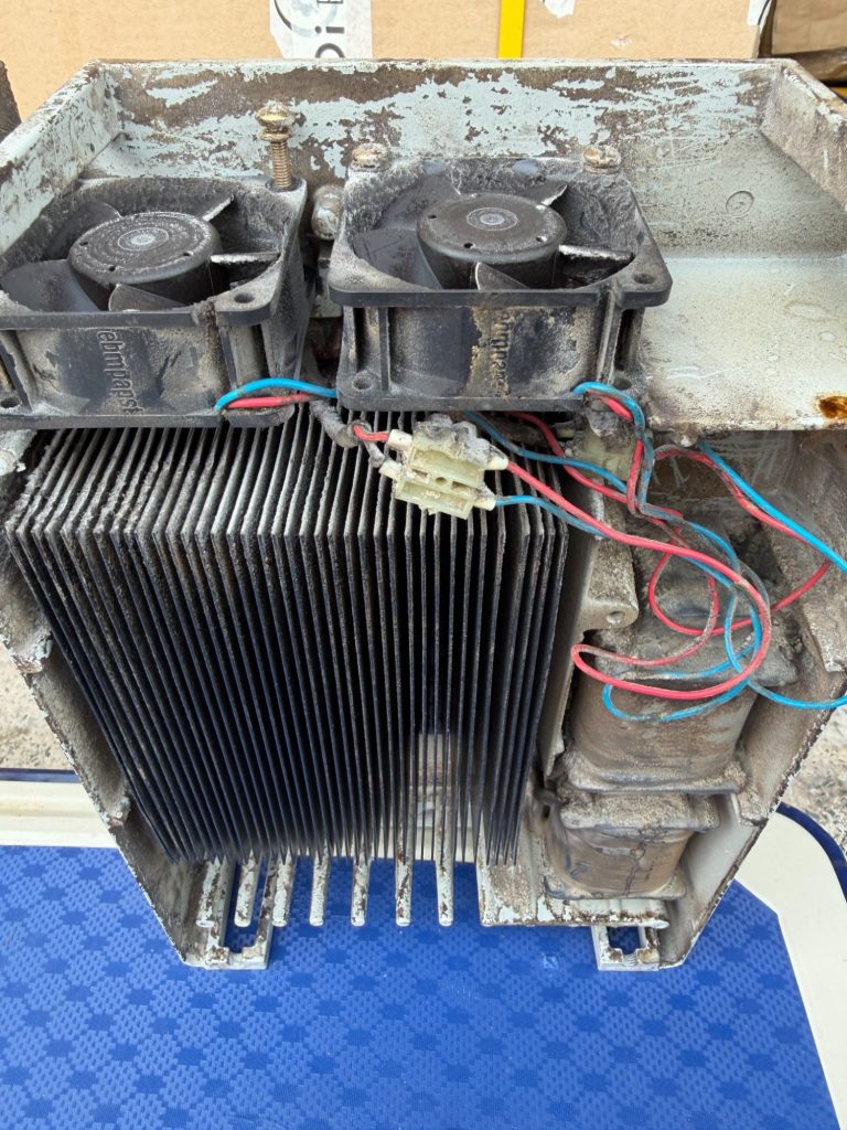 Mitsubishi PLC being repaired Mitsubishi PLC dismantled for repair