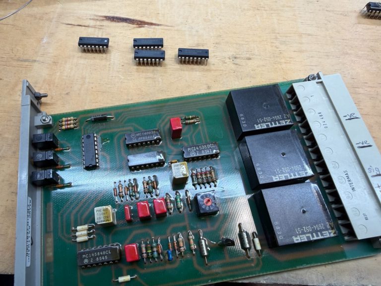 Mitsubishi PLC being repaired Mitsubishi PLC dismantled for repair